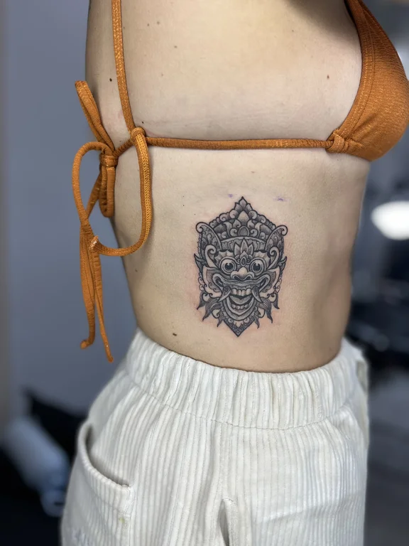 mandala blackwork deity linework elegant dotwork balinese pattern lion tattoo Canggu Bali