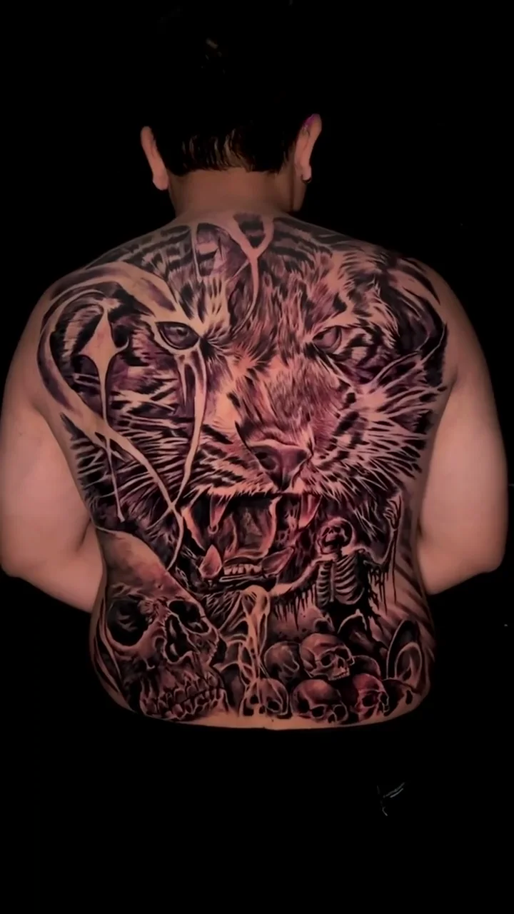 tiger snake skulls angle 01 full back big tattoo tattoo canggu bali