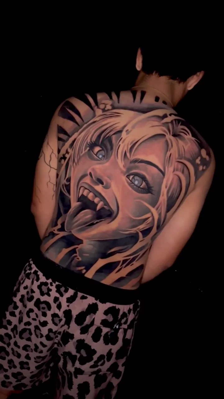 woman portrait tongue angle 02 full back big tattoo tattoo canggu bali