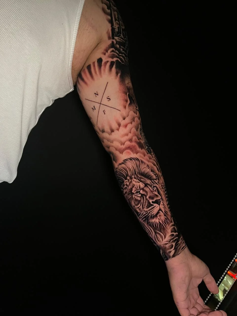 man hand full sleeve full lion animal mythology compass tattoo canggu bali