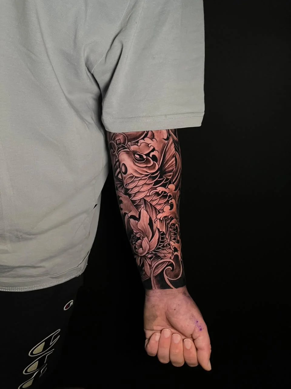 man hand japanese full sleeve full koi animal fish black big tattoo canggu bali