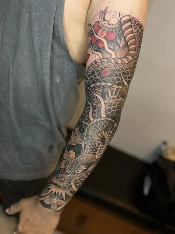 snake black grey elegant dotwork heavy shading koi full full sleeve fullsleeve tattoo canggu bali