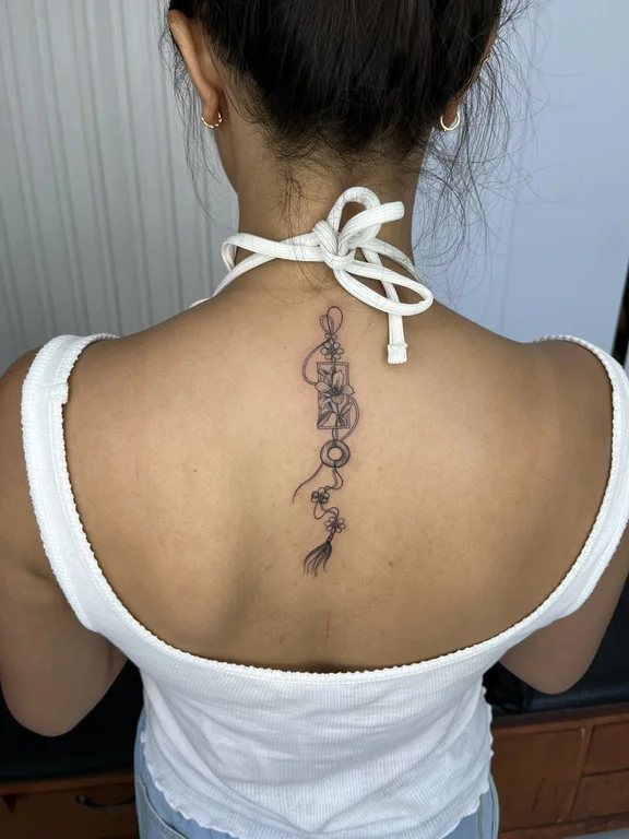 abstract blackwork snake fine line elegant linework woman soft shading tattoo Canggu Bali