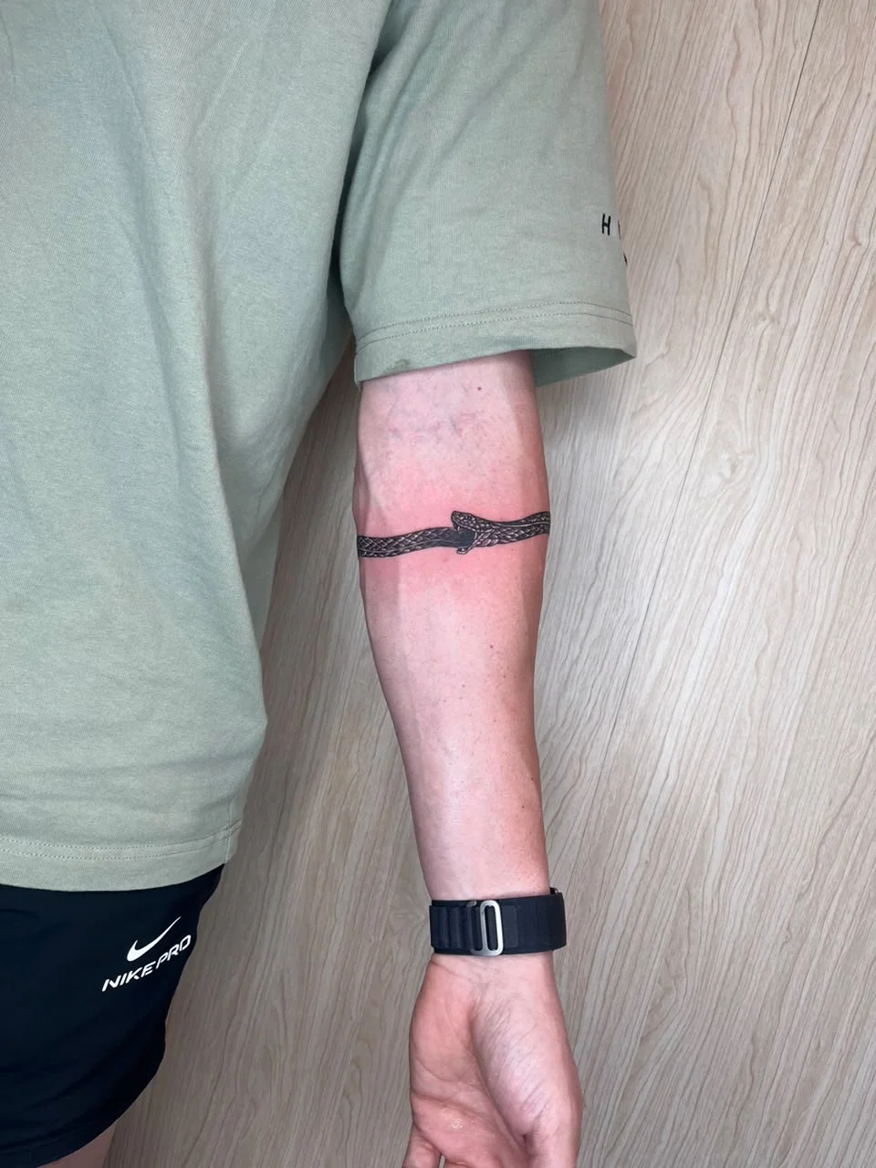 man hand black snake blackwork arm shading tattoo canggu bali