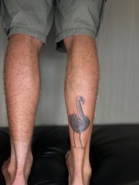 animal blackwork snake dotwork minimal black grey fine line man tattoo Canggu Bali