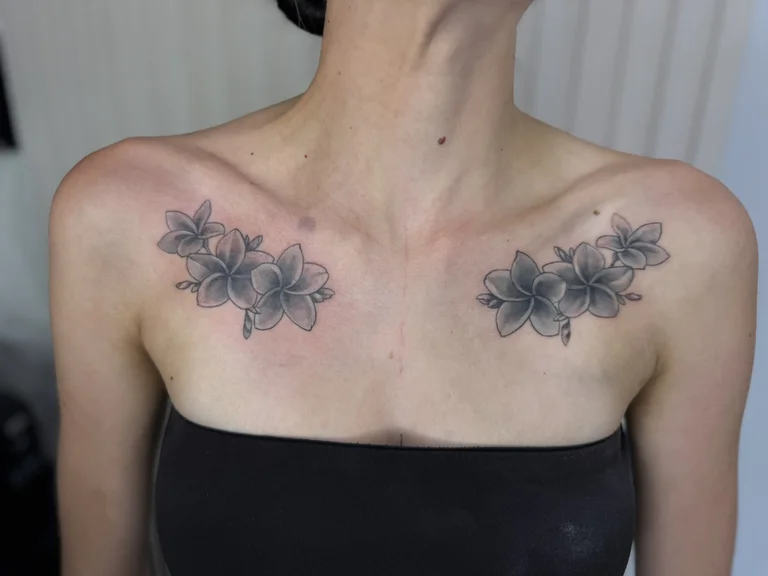 floral blackwork lotus black grey elegant soft shading dotwork linework tattoo Canggu Bali