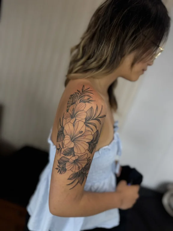 floral blackwork peony soft shading elegant linework woman black grey tattoo Canggu Bali