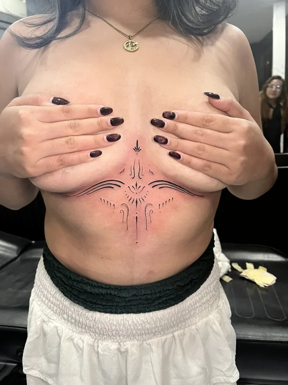 geometric blackwork woman linework spiritual fine line bold line dotwork tattoo Canggu Bali