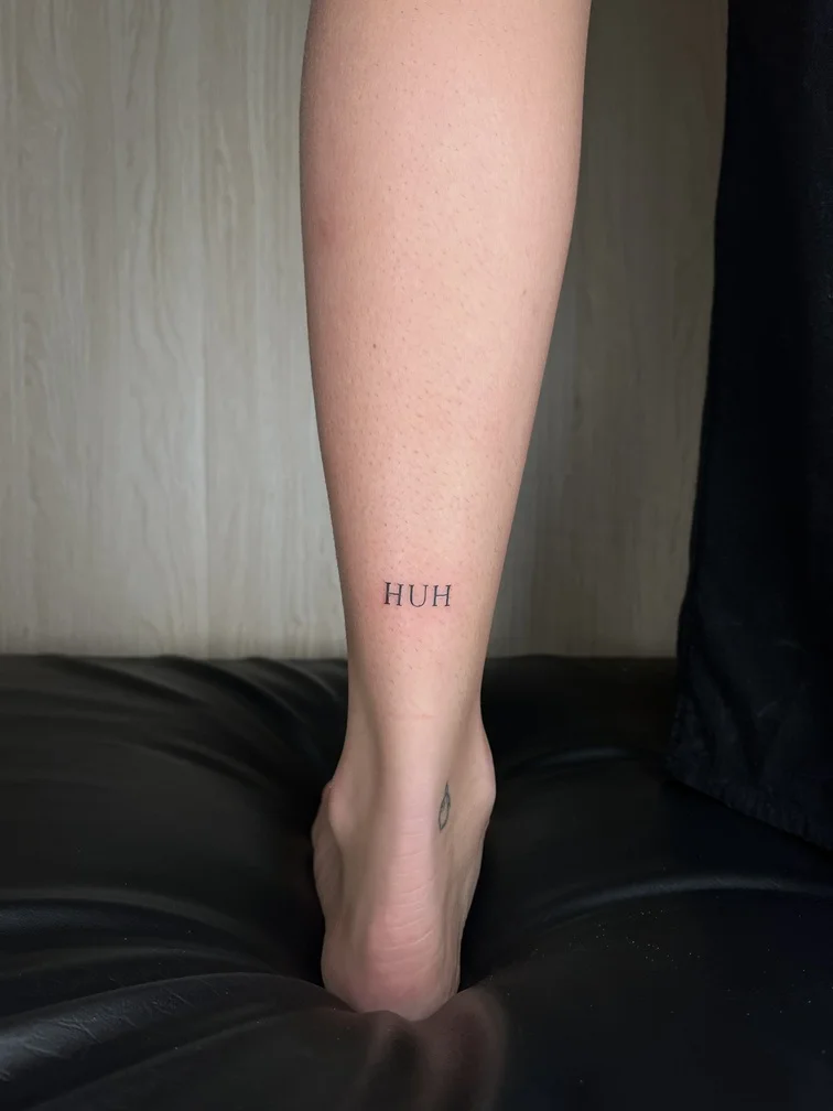 blackwork black lettering foot tattoo line linework tattoo canggu bali