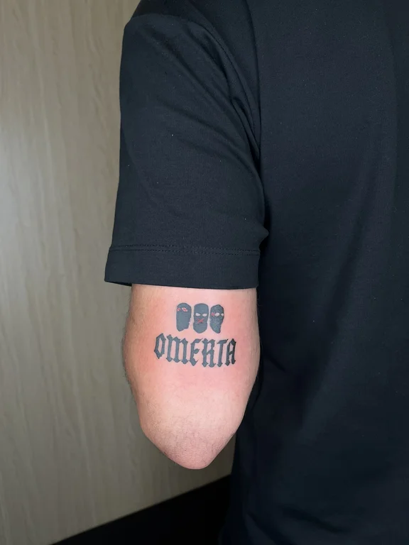 man bold line cloud minimal heavy shading tattoo canggu bali
