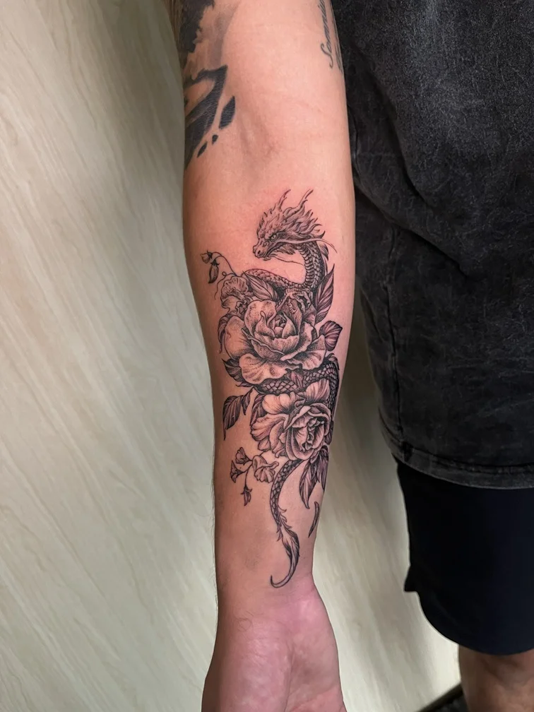 dragon flower man hand mythology black blackwork shading tattoo tattoo canggu bali