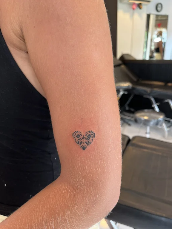 symbol blackwork butterfly dotwork minimal fine line geometric soft shading tattoo Canggu Bali