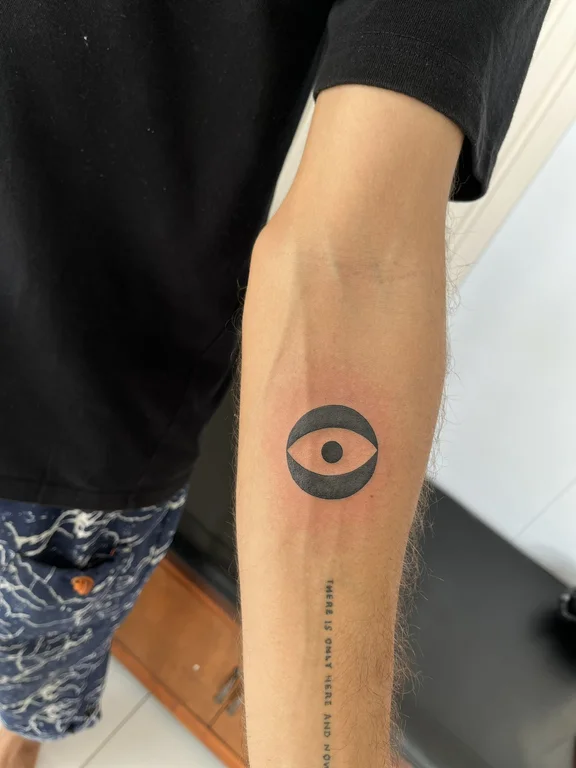 abstract minimalist eye bold line minimal moon black grey fine line tattoo Canggu Bali