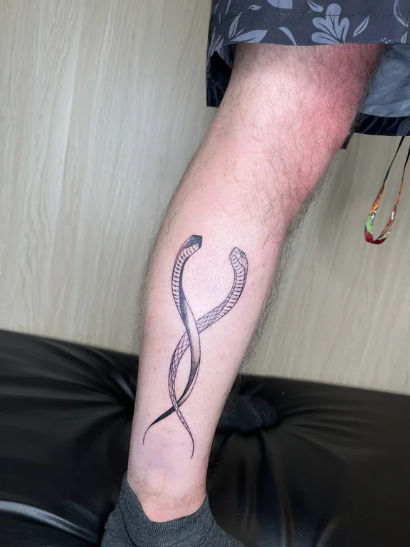 snake fine line dotwork bold line thin line tattoo canggu bali