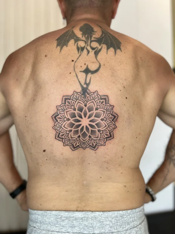 mandala dotwork deity black grey spiritual lotus balinese pattern linework tattoo Canggu Bali