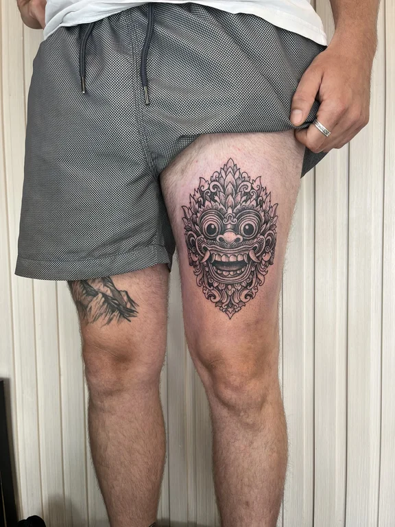 skull dotwork deity black grey cloud heavy shading balinese pattern linework tattoo Canggu Bali