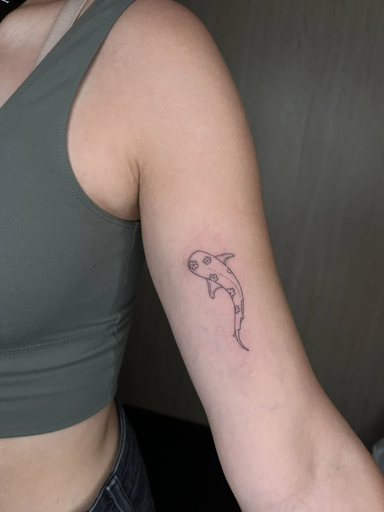 fineline linework line animal whale tattoo woman hand black tattoo canggu bali