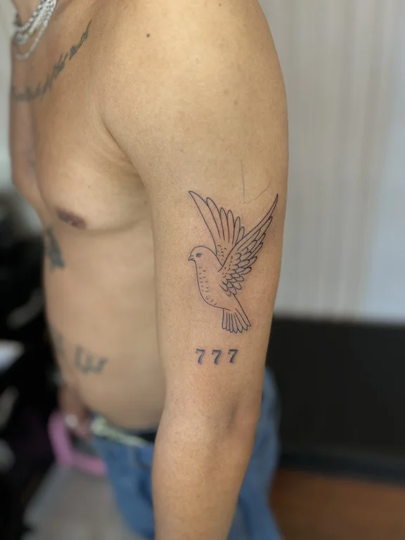 religious blackwork phoenix soft shading elegant linework dotwork spiritual tattoo Canggu Bali