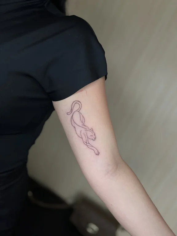 animal fine line woman soft shading elegant linework koi minimal tattoo Canggu Bali