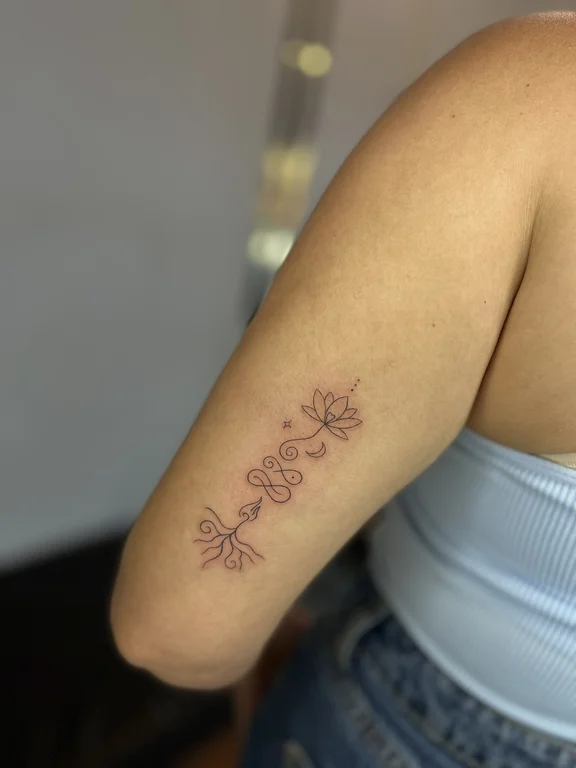 floral fine line butterfly linework elegant minimal flower soft shading tattoo Canggu Bali