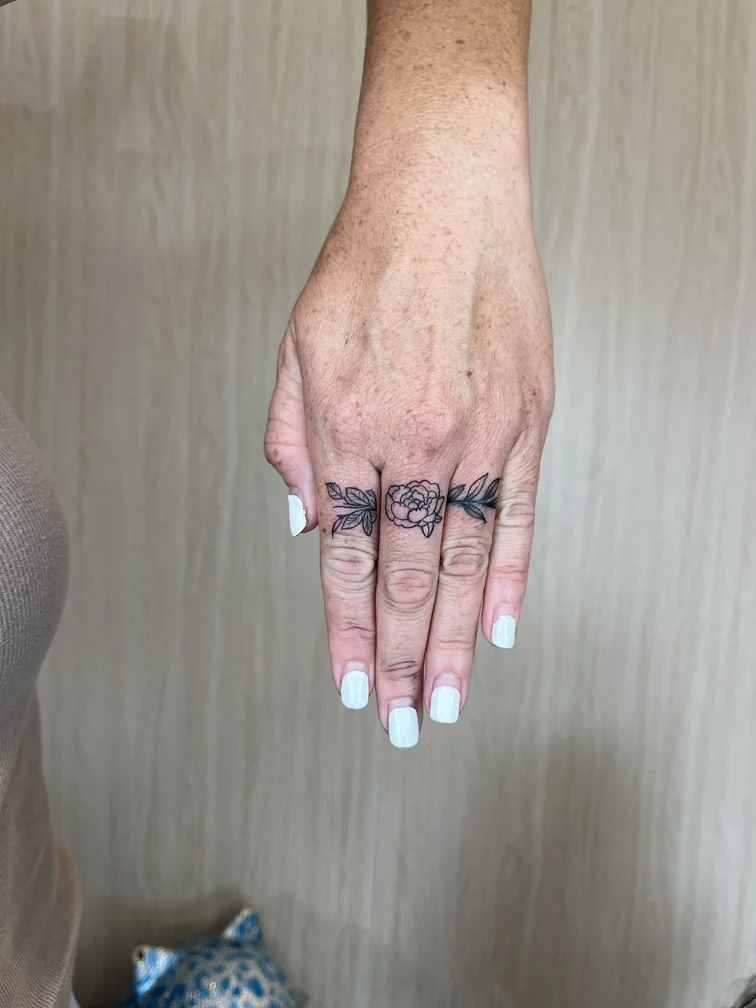 fineline finework line flower finger woman simple elegant tattoo tattoo canggu bali