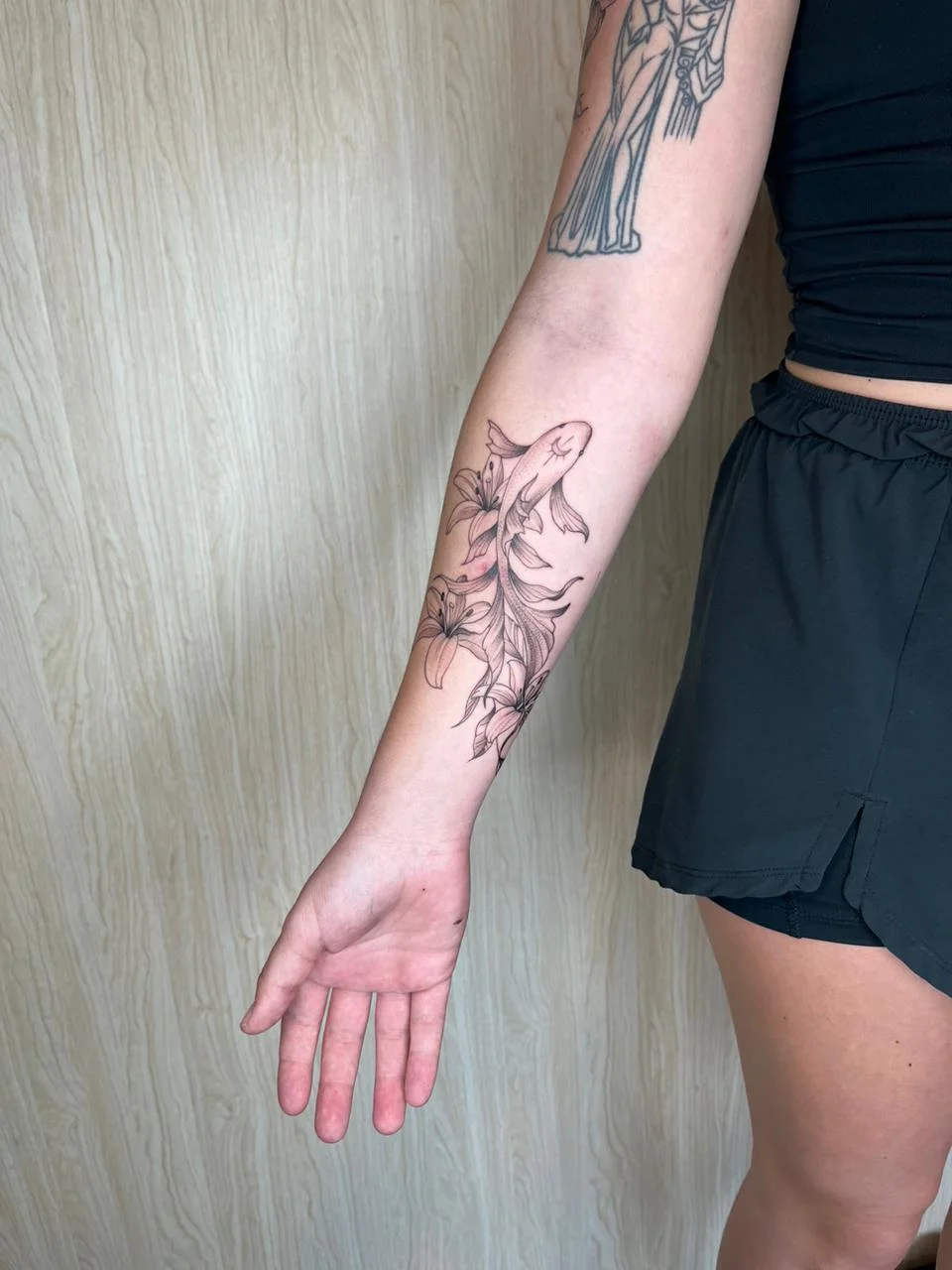 flower fish koi woman hand fineline fine line linework line tattoo canggu bali
