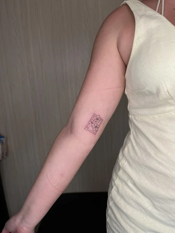 geometric blackwork lotus dotwork minimal fine line elegant soft shading tattoo Canggu Bali