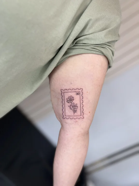 geometric blackwork peony dotwork minimal elegant linework fine line tattoo Canggu Bali