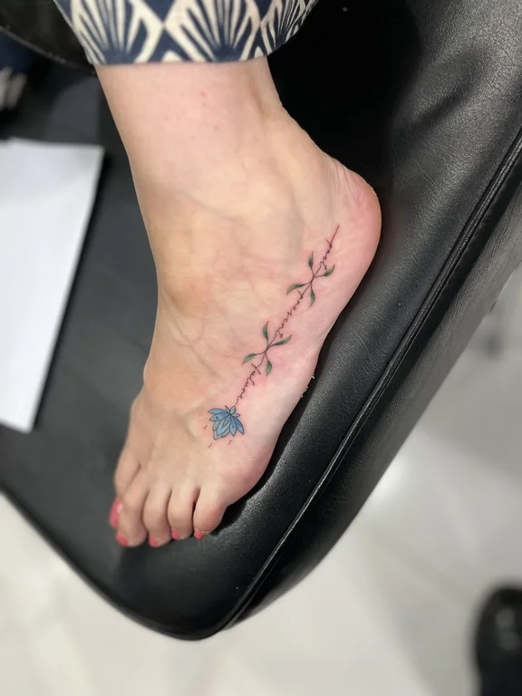 floral fine line rose soft shading elegant linework minimal spiritual tattoo Canggu Bali