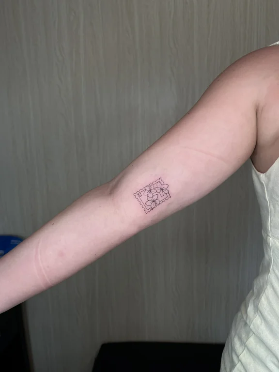 geometric blackwork woman dotwork minimal fine line linework soft shading tattoo Canggu Bali