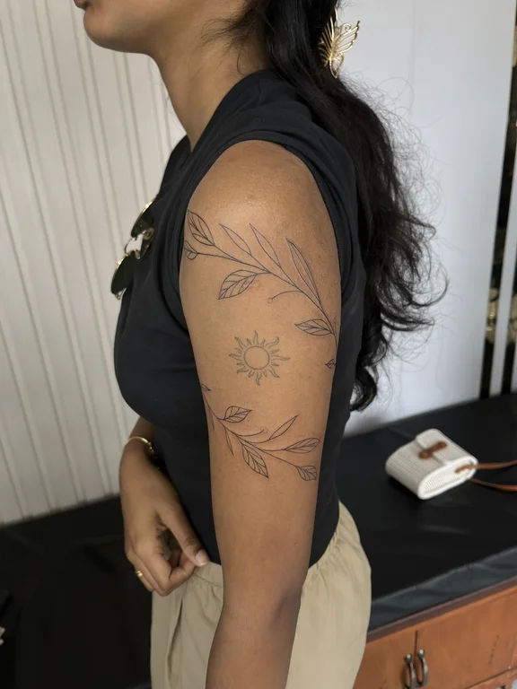floral fine line woman linework sun elegant spiritual flower tattoo Canggu Bali