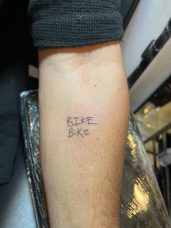 lettering fine line face bold line minimal soft shading thin line fire tattoo Canggu Bali