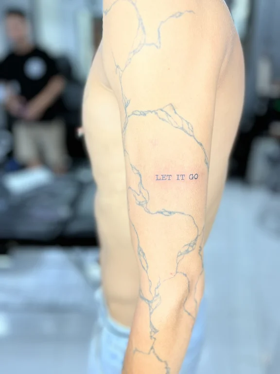 lettering fine line man bold line cloud minimal linework spiritual tattoo Canggu Bali