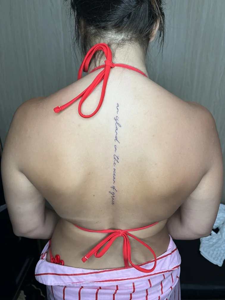 woman back fine line linework line lettering tattoo canggu bali
