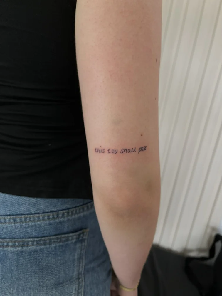 woman hand lettering fine line line work line small simple tattoo canggu bali