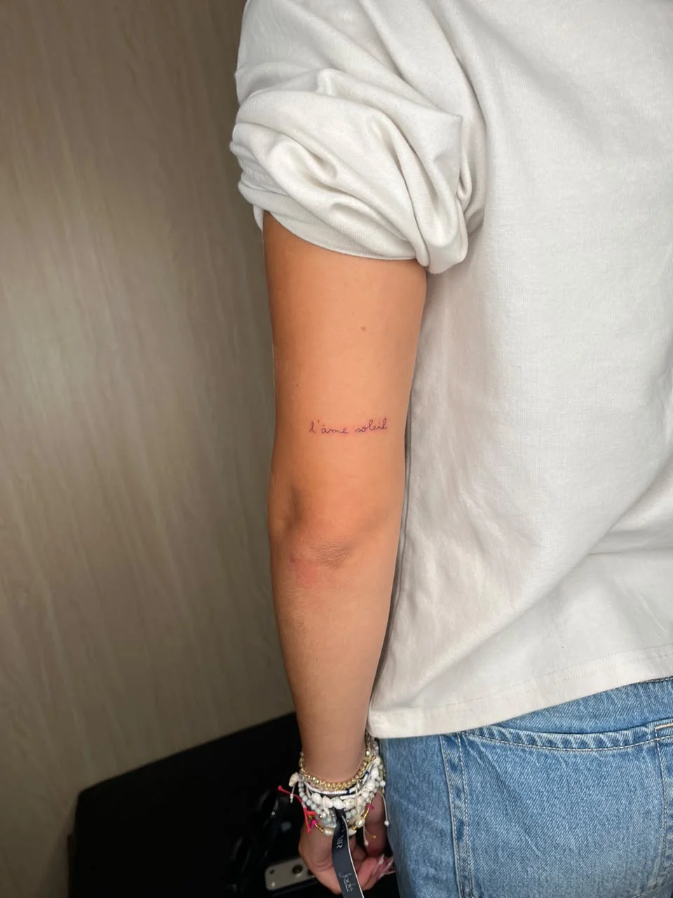 woman hand small minimalist lettering fine line line work line tattoo canggu bali