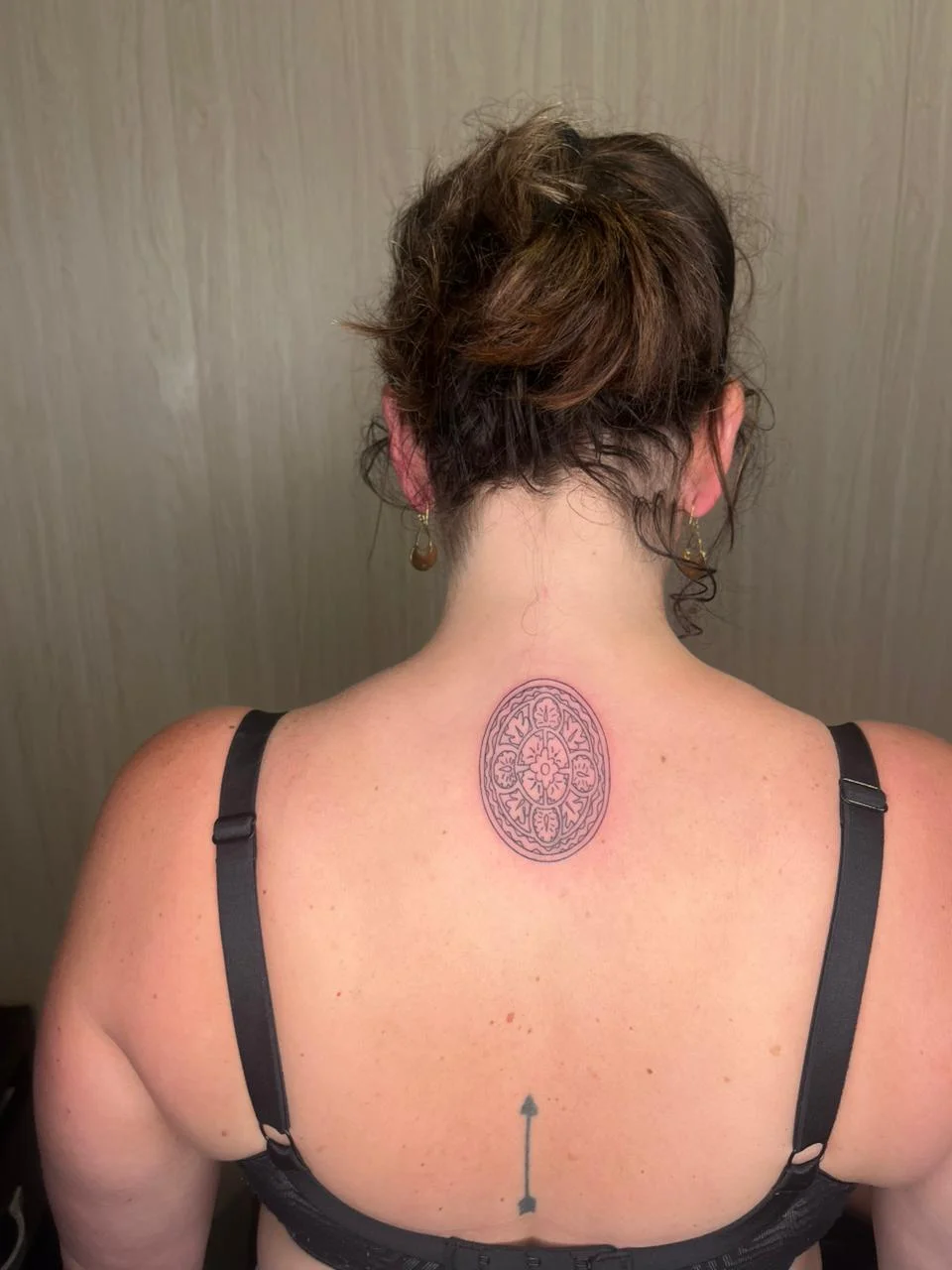 woman back tribal mandala fine line line work line tattoo canggu bali