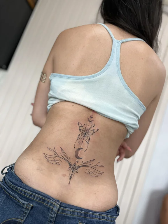 nature fine line woman linework elegant flower soft shading minimal tattoo Canggu Bali