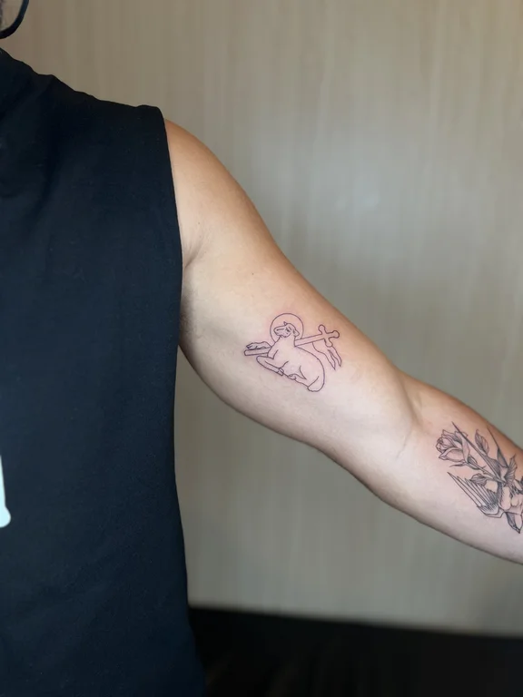linework cloud hand soft shading lamb god tattoo canggu bali
