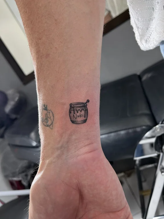 symbol fine line man black grey minimal soft shading cloud fire tattoo Canggu Bali