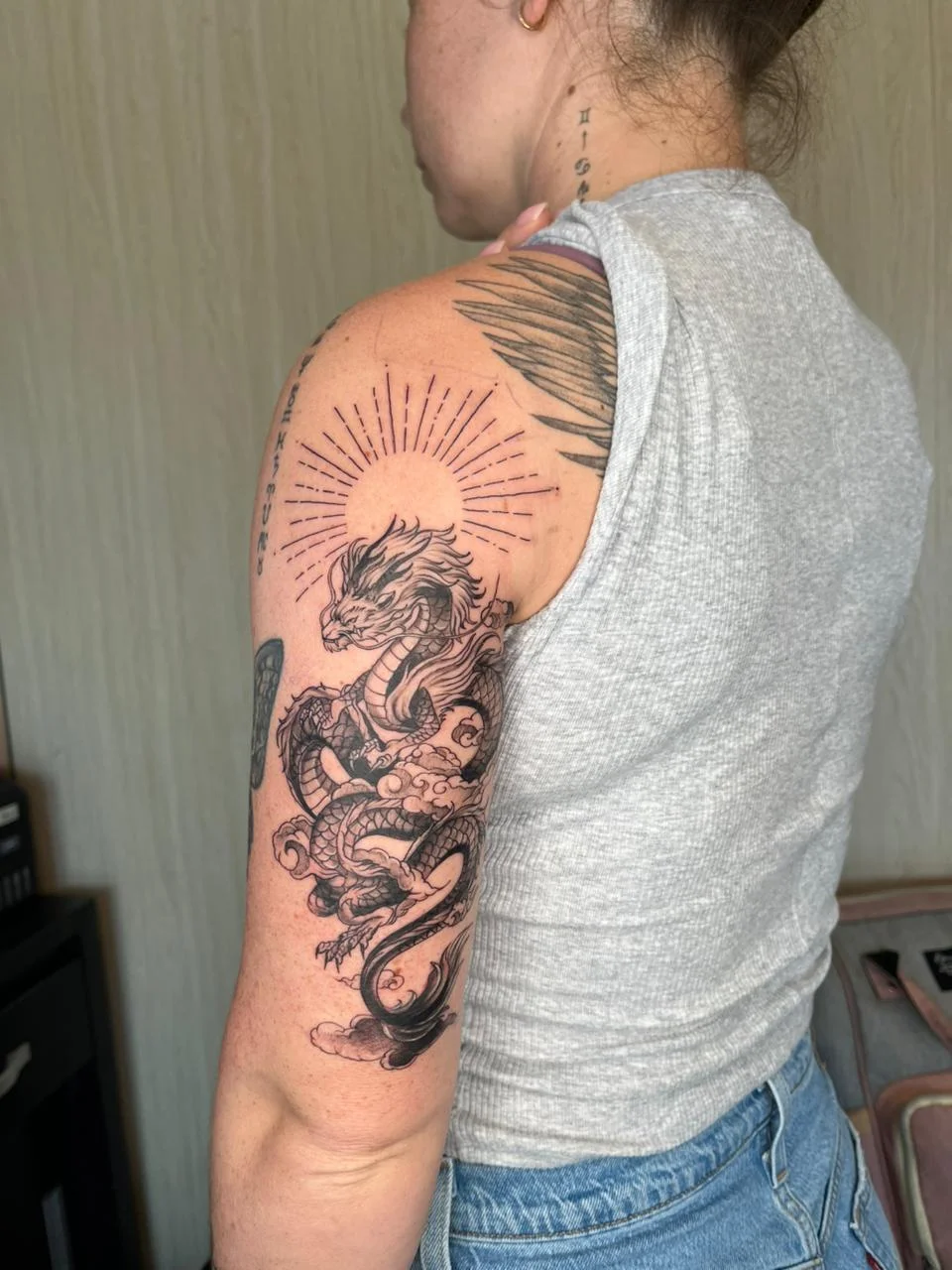 woman hand dragon japanese mythology black shading black work tattoo canggu bali