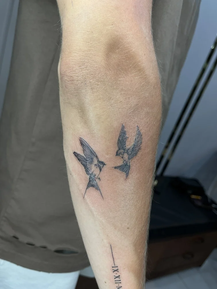 man hand bird animal linework fine line line shading black tattoo canggu bali