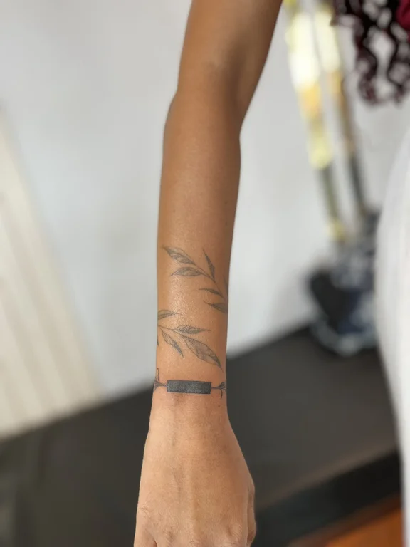 abstract minimalist hand fine line minimal elegant leaf thin line tattoo Canggu Bali
