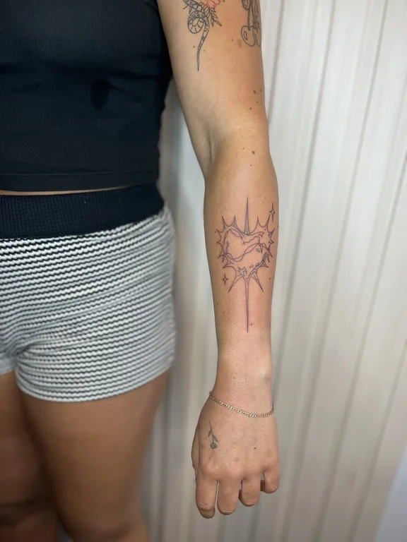 abstract minimalist lotus dotwork sun linework minimal fine line tattoo Canggu Bali