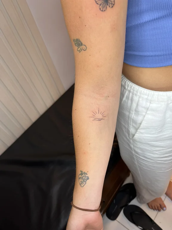 abstract minimalist lotus fine line minimal elegant soft shading dotwork tattoo Canggu Bali