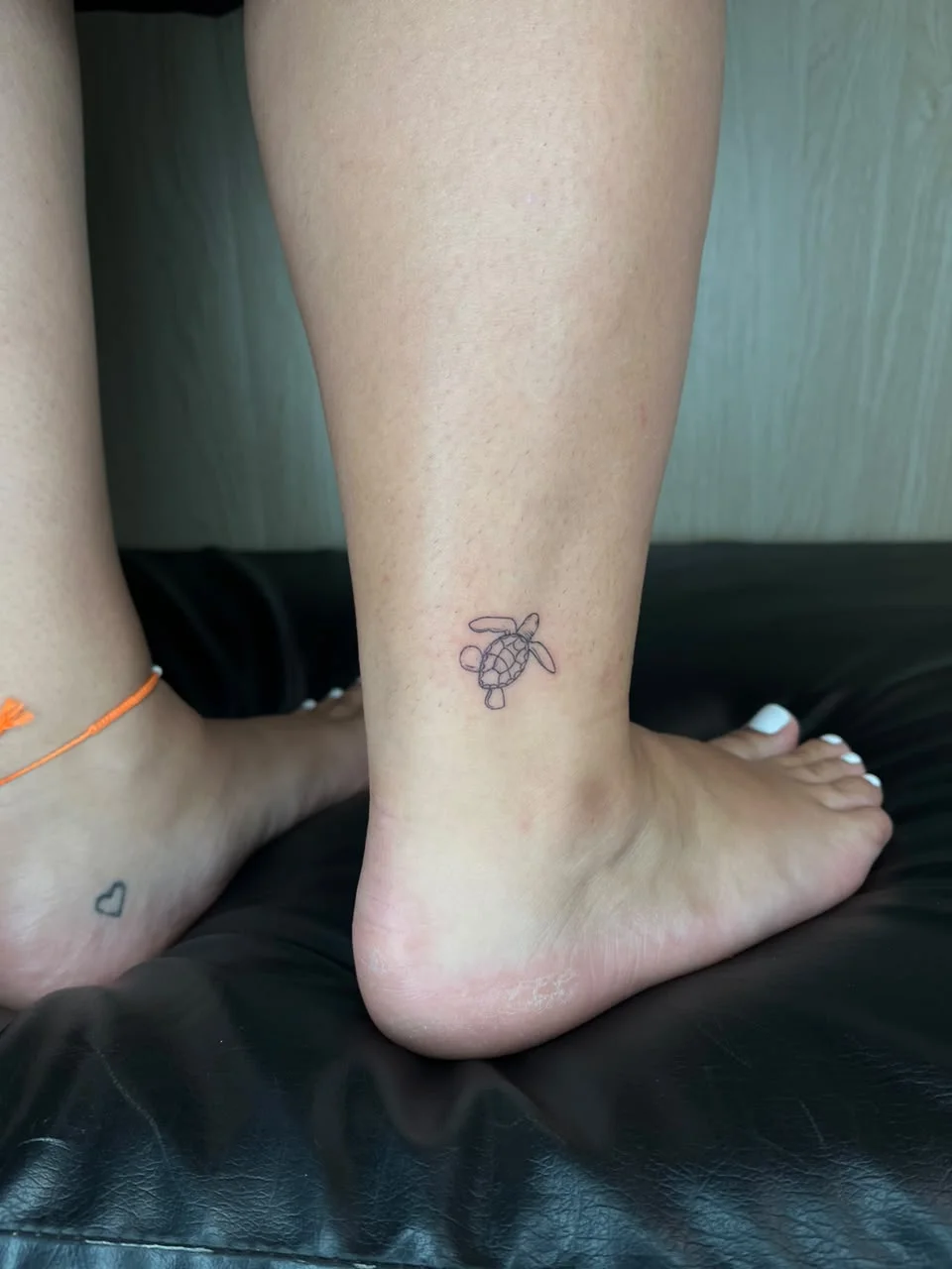 woman leg foot turtle animal minimalist fine line line work line tattoo canggu bali