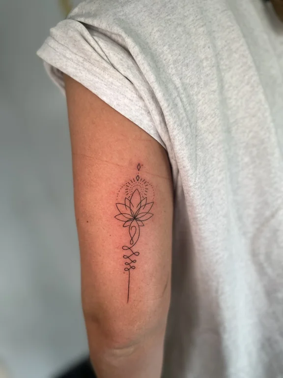 floral minimalist lotus dotwork spiritual elegant minimal fine line tattoo Canggu Bali