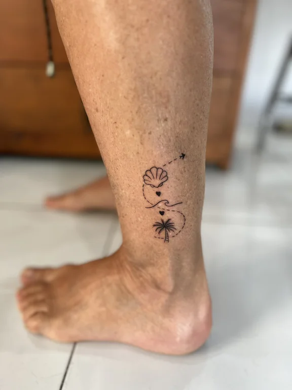 floral minimalist lotus fine line minimal moon soft shading elegant tattoo Canggu Bali