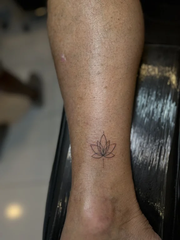 floral minimalist lotus fine line spiritual dotwork soft shading minimal tattoo Canggu Bali