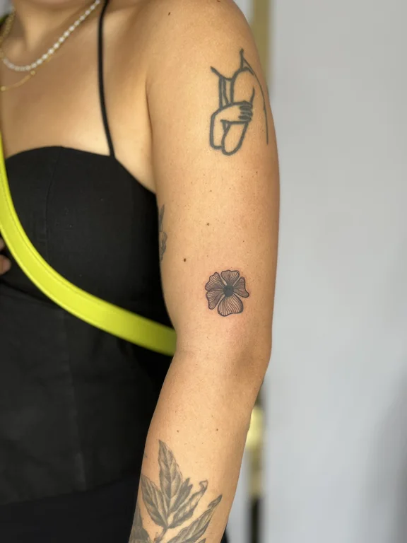 floral minimalist peony dotwork sun lotus black grey fine line tattoo Canggu Bali